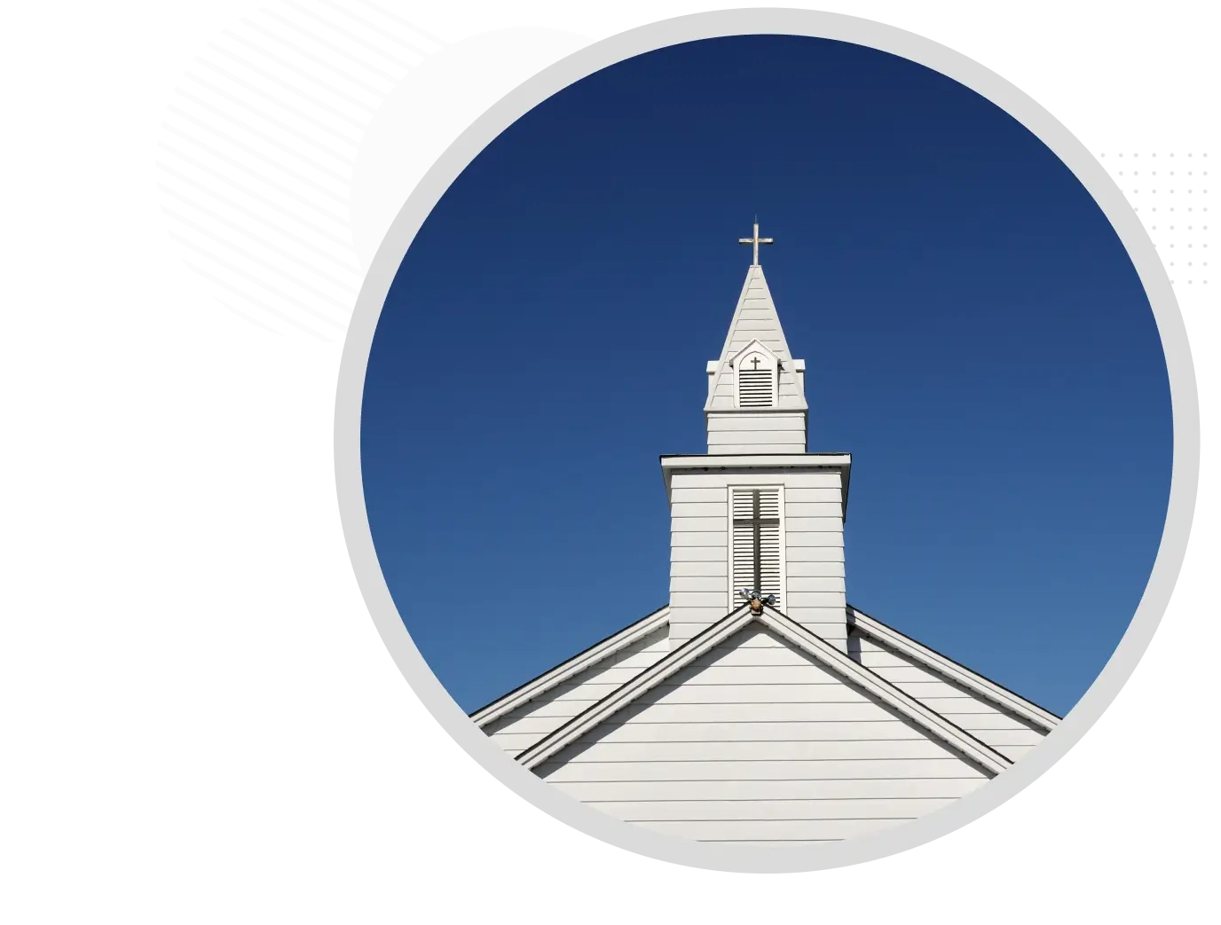 A church steeple with a cross on top of it.